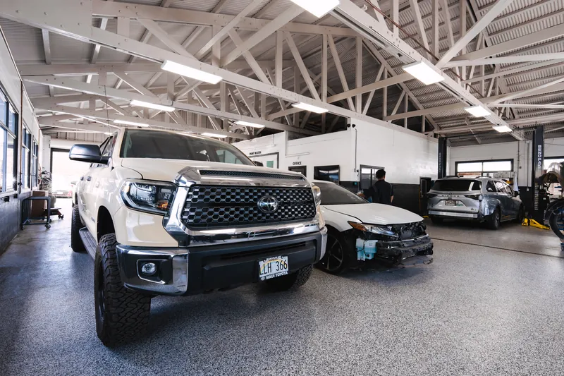 The 417 Autoworks shop floor with vehicles in for repair